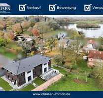 Haus zum Kaufen in Molfsee 690.000,00 € 163.49 m²