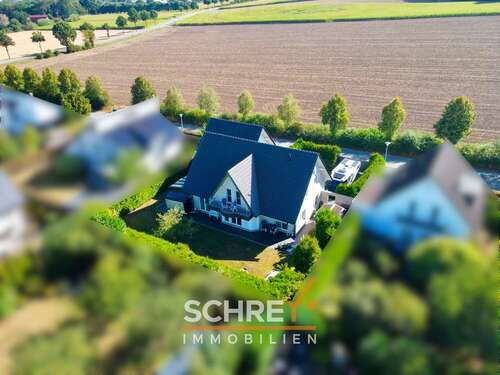 Foto - Haus zum Kaufen in Wallenhorst Rulle 795.000,00 € 206.96 m²