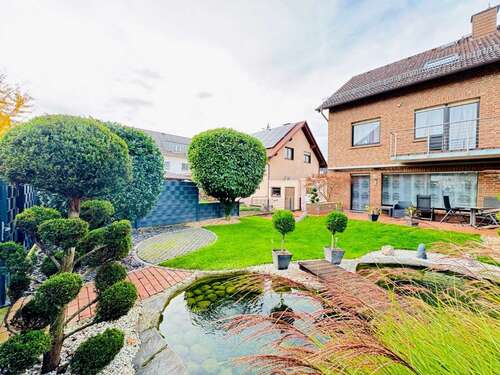 Foto - Haus zum Kaufen in Flörsheim 598.500,00 € 164 m²