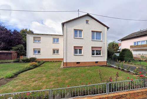 Foto - Haus zum Kaufen in Nieder Erlenbach 889.000,00 € 210 m²