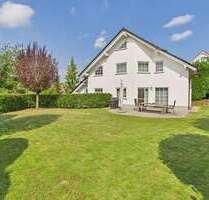 Haus zum Kaufen in Nieder-Olm 1.195.000,00 € 210 m²