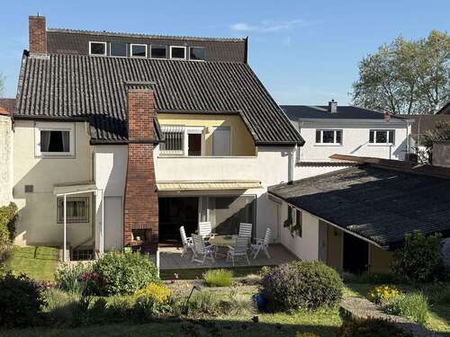 Foto - Haus zum Kaufen in Nidderau-Heldenbergen 419.000,00 € 239 m²