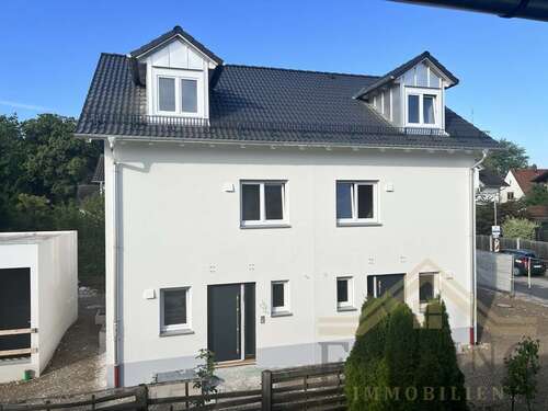 Foto - Haus zum Kaufen in Grasbrunn Neukeferloh 1.275.000,00 € 121 m²