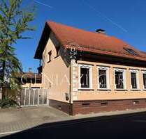 Haus zum Kaufen in Oberhausen-Rheinhausen 370.000,00 € 159 m²