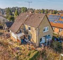 Haus zum Kaufen in Hambühren 178.000,00 € 117.25 m²