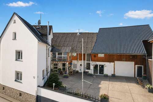 Foto - Haus zum Kaufen in Schöffengrund Schwalbach 335.000,00 € 320.78 m²