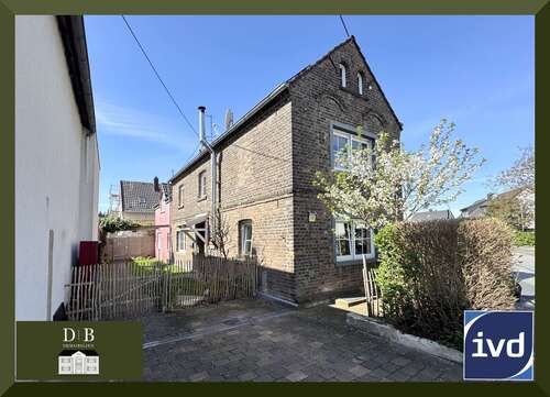 Foto - Haus zum Kaufen in Niederkassel Mondorf 399.990,00 € 125 m²