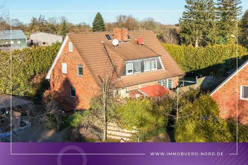 Foto - Haus zum Kaufen in Sarlhusen 229.000,00 € 105.23 m²