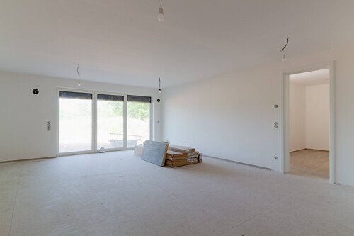 Wohnzimmer 1.0 - Großzügige Wohnung mit Garten im KFW 40 Energiesparhaus Trier mit Top Verkehranbindung Luxemburg