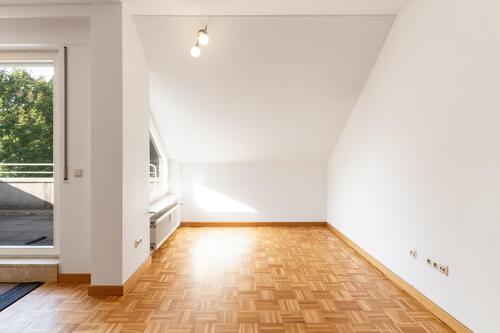 Wohnzimmer 1.1 - 2 Zimmer Dachgeschoßwohnung in Trier