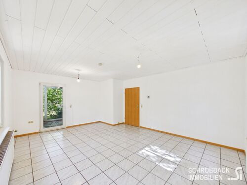 Wohnzimmer mit Zugang zum Wintergarten - 