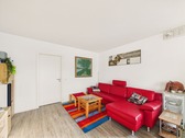 Wohnzimmer - Fernsehecke - Dachgeschoßwohnung mit 71,77 m&sup2; in Schönefeld zum Kaufen