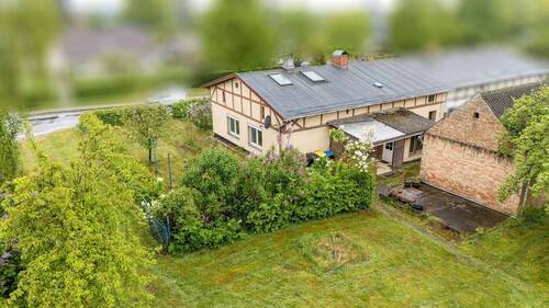 Wohnhaus Rückansicht - Doppelhaushälfte mit 110,00 m&sup2; in THELKOW zum Kaufen