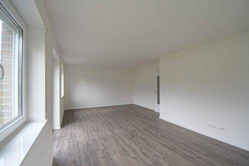 Wohnzimmer - Doppelhaushälfte mit 122,70 m² in Edewecht zur Miete