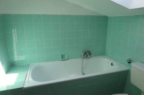 Badezimmer mit Wanne DG - 