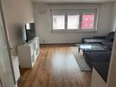 Wohnzimmer 
- Etagenwohnung mit 75,00 m² in Nürnberg zur Miete
