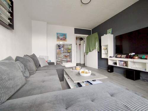 Wohnzimmer - Charmante Dachgeschosswohnung für Singles und Paare!