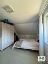 Schlafzimmer Einliegerwohnung rechts - Energieeffizientes hochwertiges 3-Familienhaus in Neudorf-Platendorf