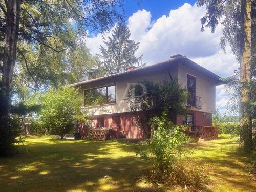 Seiten-/Rückansicht Haus - 