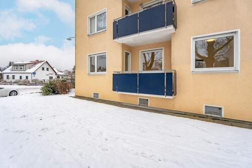 Hinteransicht mit Balkon - 