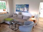 Wohnzimmer mit Sitzecke - 2 Zimmer Etagenwohnung in Timmendorfer Strand