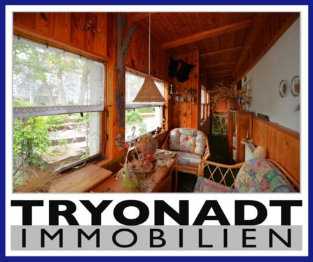 Titelbild - Einfamilienhaus mit Wintergarten im Grünen