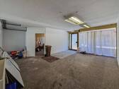 Ladenfläche im Erdgeschoss - 7 Zimmer Mehrfamilienhaus, Wohnhaus zum Kaufen in Wilster