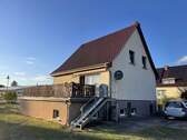 Ansicht Osten - Einfamilienhaus mit geräumigen Ferienhaus und seitlichem Seeblick auf dem Woblitzsee