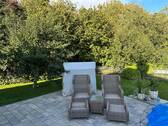 Außensitzbereich am Pool - Bungalow mit 120,00 m² in Schönkirchen zum Kaufen
