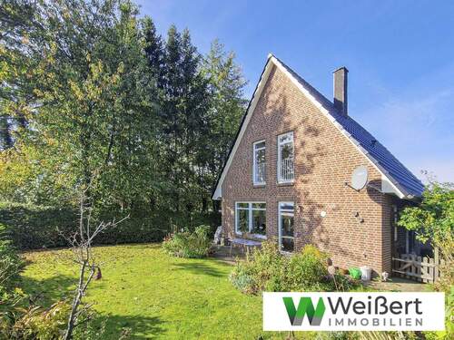 Titelbild - Stilvolles & energieeffizientes Architektenhaus mit moderner Ausstattung und gepflegtem Garten im schönen Schenefeld