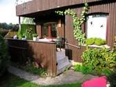 Bungaloweingang mit Terrasse - 