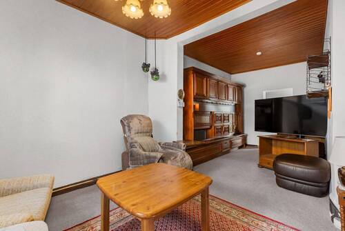 Wohnzimmer im EG - 6 Zimmer Einfamilienhaus zum Kaufen in Düsseldorf