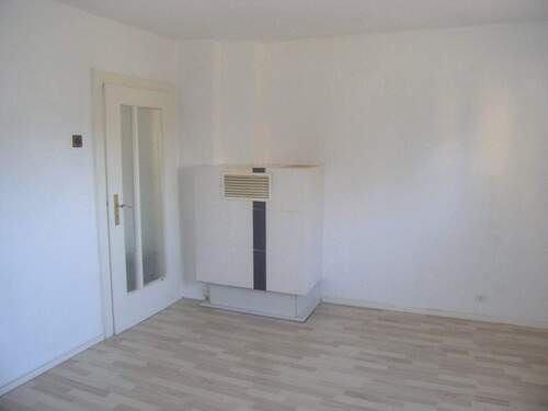 Wohnzimmer mit Kachelofen - 