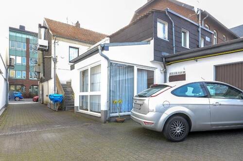 Rückansicht links - Grundstück in Leverkusen-Wiesdorf