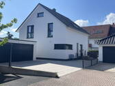 Außen Frontansicht - 4 Zimmer Einfamilienhaus zum Kaufen in Harthausen