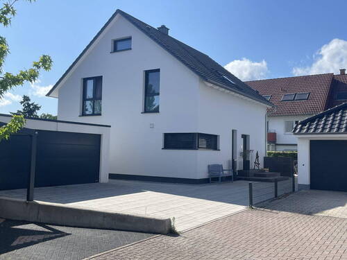 Außen Frontansicht - 4 Zimmer Einfamilienhaus zum Kaufen in Harthausen