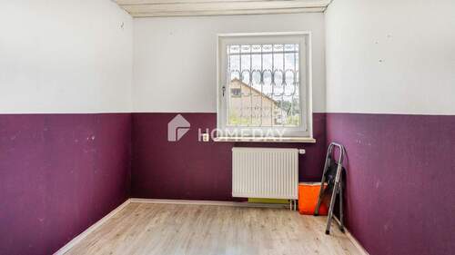 1. OG Schlafzimmer 1 - 