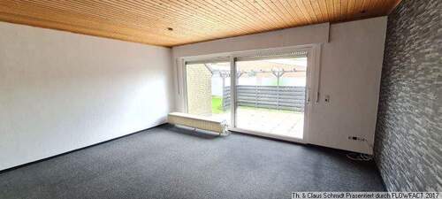 Blick ins Wohnzimmer - 5 Zimmer Einfamilienhaus zum Kaufen in Ovelgönne