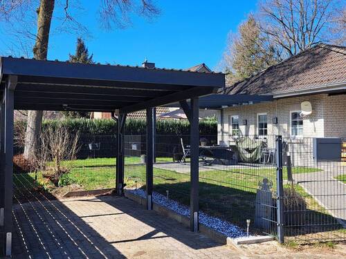 Ansicht mit Carport - 3 Zimmer Bungalow zum Kaufen in Hohenlockstedt