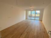 Wohnzimmer.jpg - 3 Zimmer Terrassenwohnung zum Kaufen in Freilassing