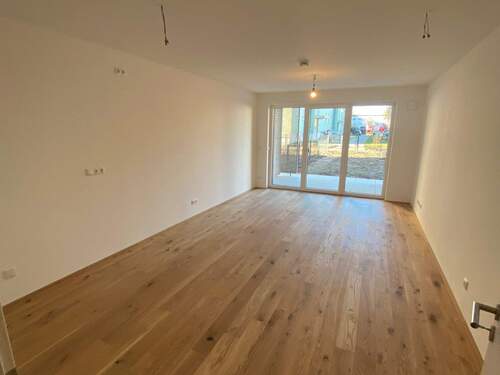 Wohnzimmer.jpg - 3 Zimmer Terrassenwohnung zum Kaufen in Freilassing