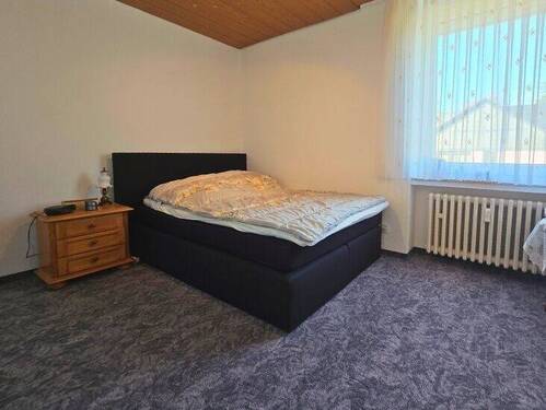 Ruhiges Schlafzimmer mit harmonischer Atmosphäre – perfekt zum Abschalten. - 