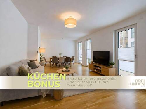 Ansicht I: Wohn- und Esszimmer mit einem Möblierungsbeispiel - **KÜCHENBONUS** Großzügige 2-Zimmer-Wohnung mit privater Terrasse im Neubauquartier DREILINDEN Living