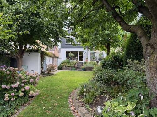Gartenansicht - Charmantes 2-Familienhaus - 320.000,00 EUR Kaufpreis, ca.  153,00 m² Wohnfläche