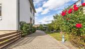 Zufahrt Garten/Garagen - Mehrfamilienhaus, Wohnhaus mit 213,60 m² in Einbeck zum Kaufen