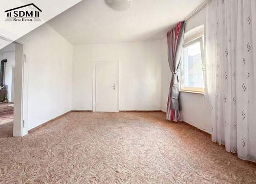 03_Wohnzimmer_OG.jpg - 7 Zimmer Mehrfamilienhaus, Wohnhaus in Graben-Neudorf