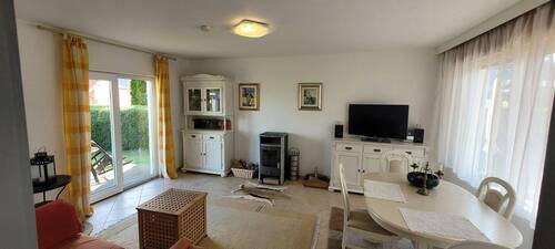 Wohnzimmer mit Kamin - Mehrfamilienhaus, Wohnhaus mit 55,00 m&sup2; in Göhren-Lebbin zum Kaufen