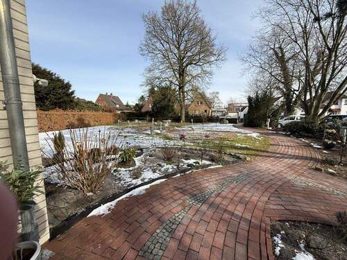 Blick in den Garten - Mehrfamilienhaus, Wohnhaus mit 539,00 m&sup2; in Schortens zum Kaufen
