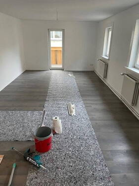 Wohnzimmer 1.OG m. Balkon - 