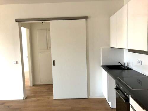 Küche mit Schiebetür zum Flur - Etagenwohnung mit 55,00 m² in Hamburg zum Kaufen